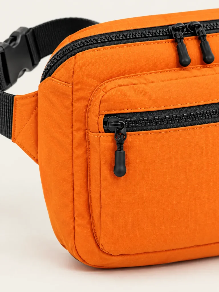 Close-up of Belt Loop Bag front zip pocket and webbing clip buckle