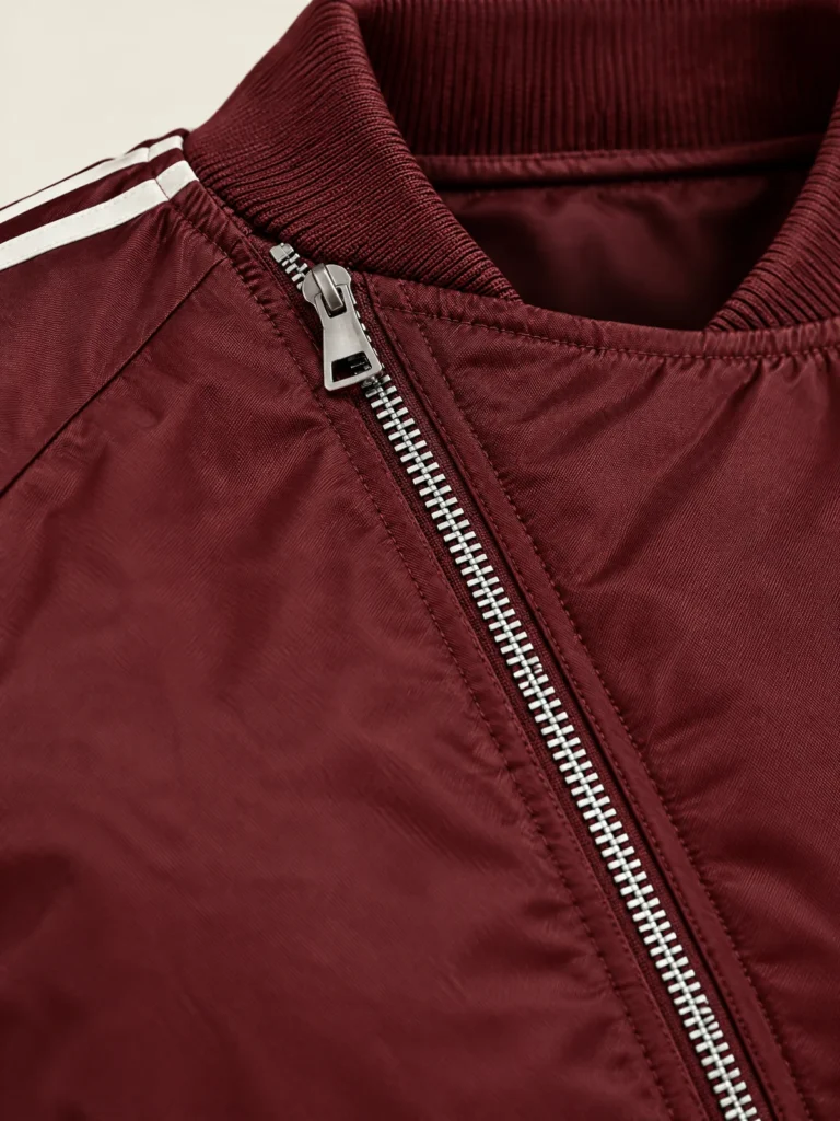 Close-up of diagonal zip detail on Oxblood Diagonal Bomber jacket