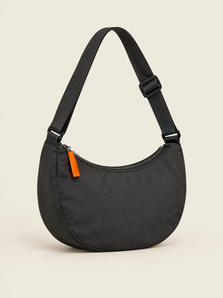 Half-Moon Zip Bag front view in Asphalt with Signal orange zip pull