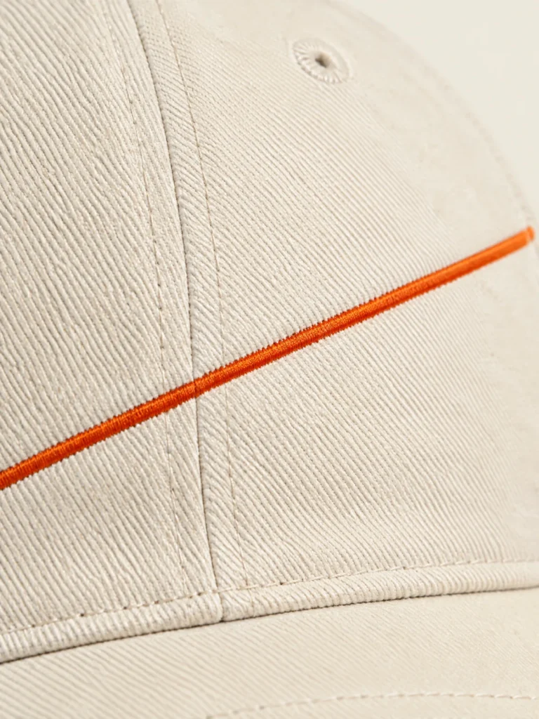 Close-up of diagonal Signal embroidery across cap panels
