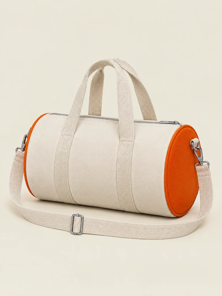 Mini Barrel Bag showing side profile and detachable shoulder strap