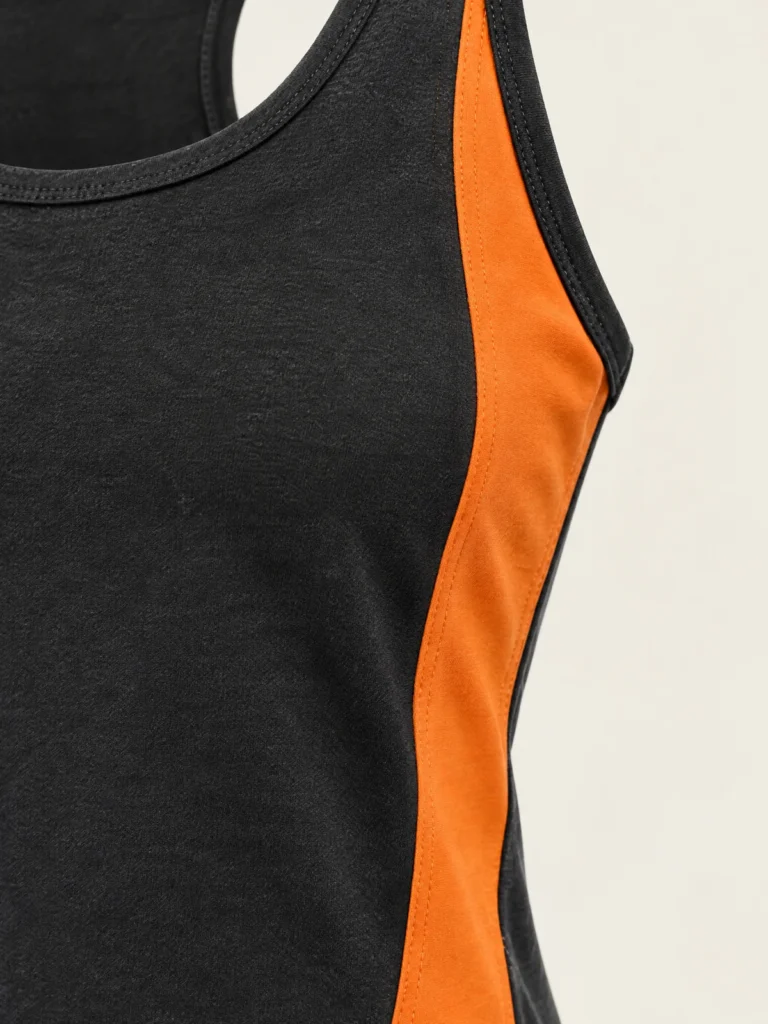 Close-up of diagonal Signal panel and bound armhole on Asphalt jersey