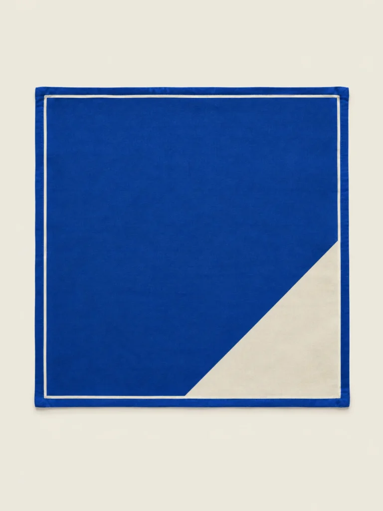 Panel Bandana in Lane Blue with diagonal chalk corner print, front view
