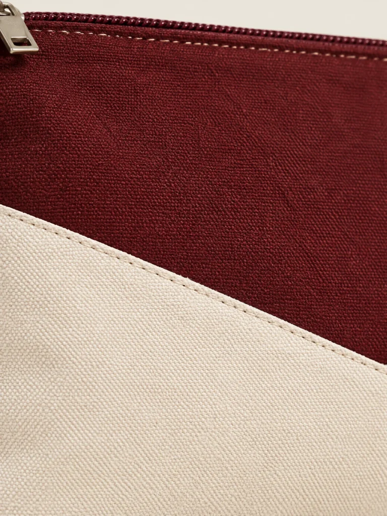Close-up of diagonal seam and wrist strap on Panel Pouch