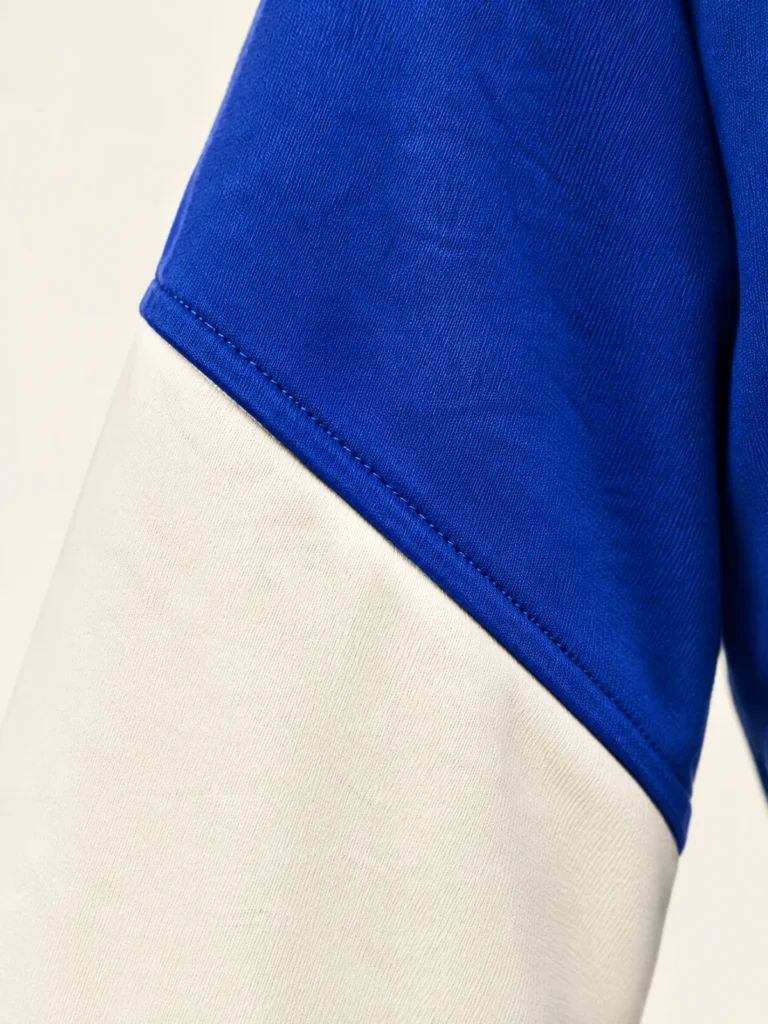 Close-up of diagonal elbow seam on Chalk panelled sleeve detail