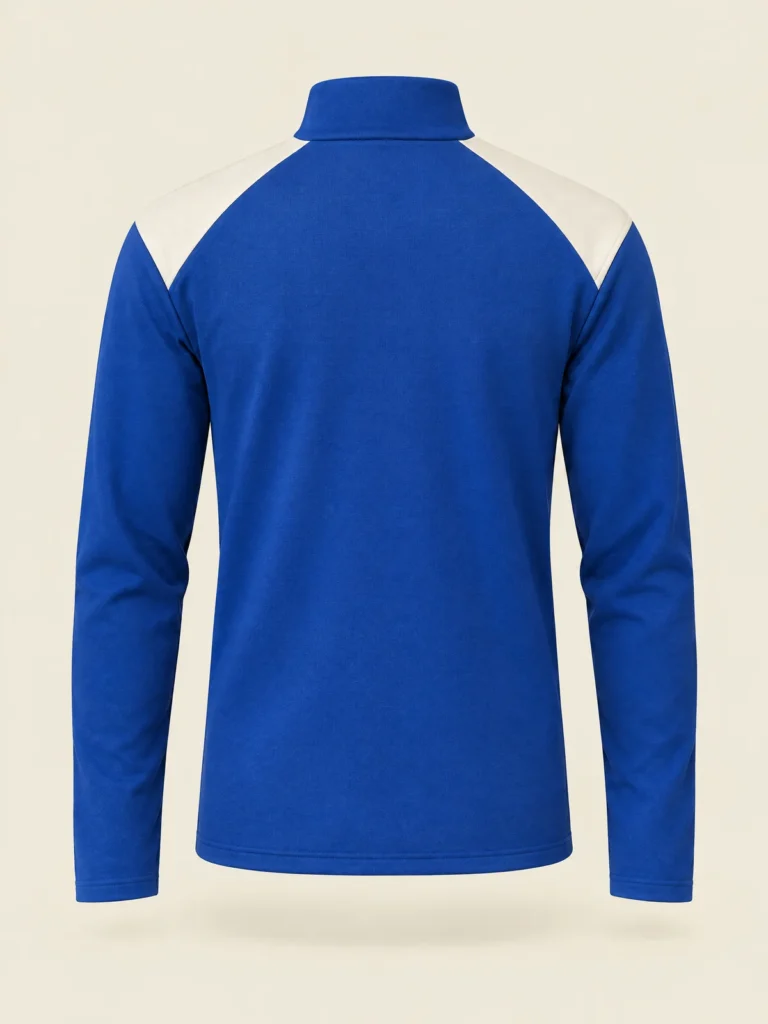 Back view of Relay Zip Mock Neck showing diagonal Chalk shoulder panel seams